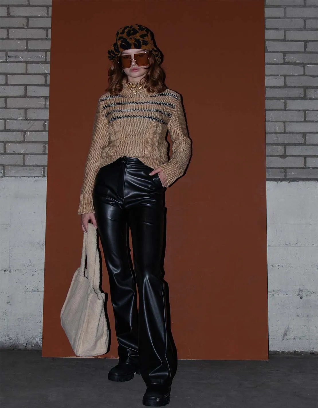 Vegan leather flared trousers